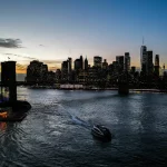 An outpost of The Second City has opened in Brooklyn. Above, the Brooklyn Bridge and lower Manhattan skyline are pictured at sunset.