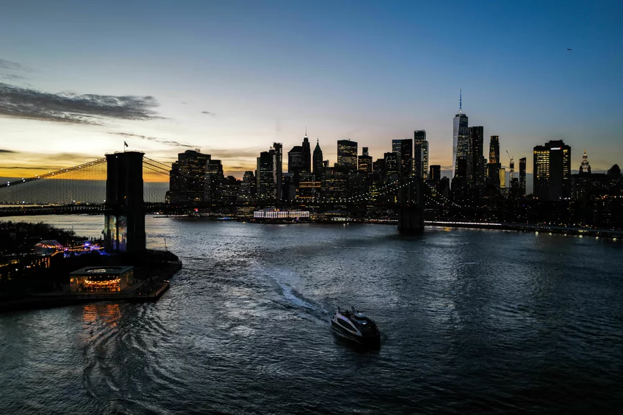 An outpost of The Second City has opened in Brooklyn. Above, the Brooklyn Bridge and lower Manhattan skyline are pictured at sunset.